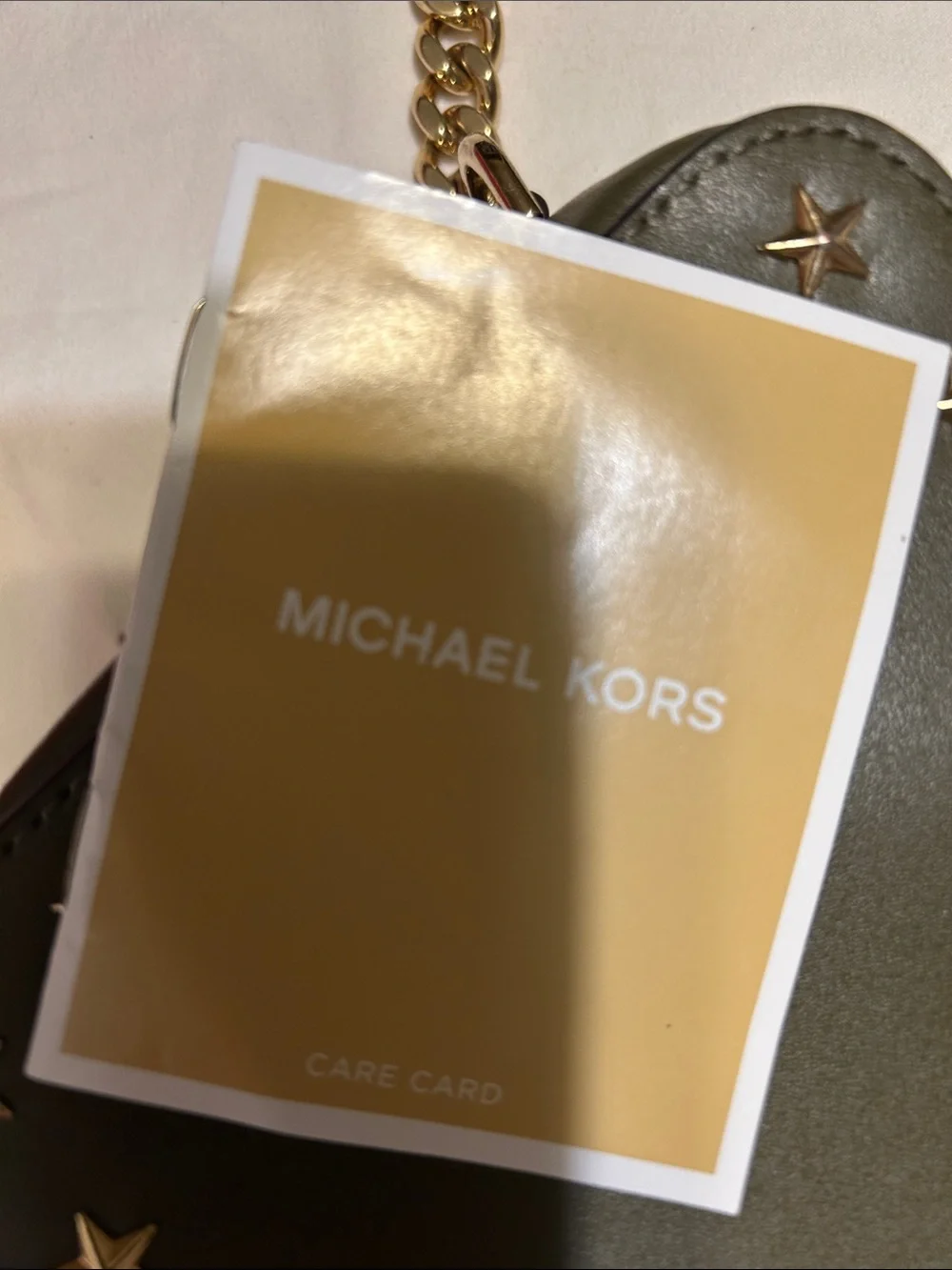 Michael Kors Black Star-Accent Crossbody Bag with Gold Chain